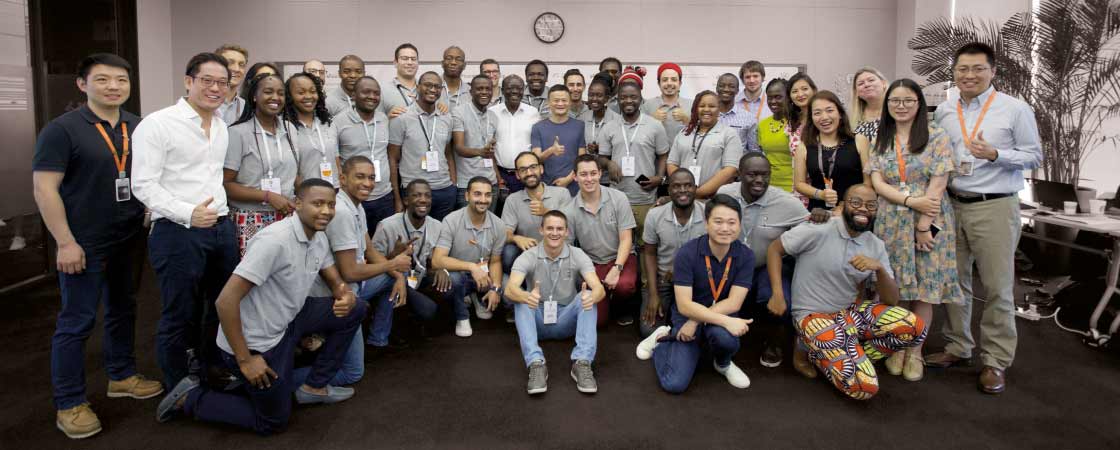 Alibaba Group co-founder and executive chairman Jack Ma and UNCTAD Secretary-General Mukhisa Kituyi pose with young entrepreneurs from 11 countries in Africa on June 28, 2018 in Hangzhou, China