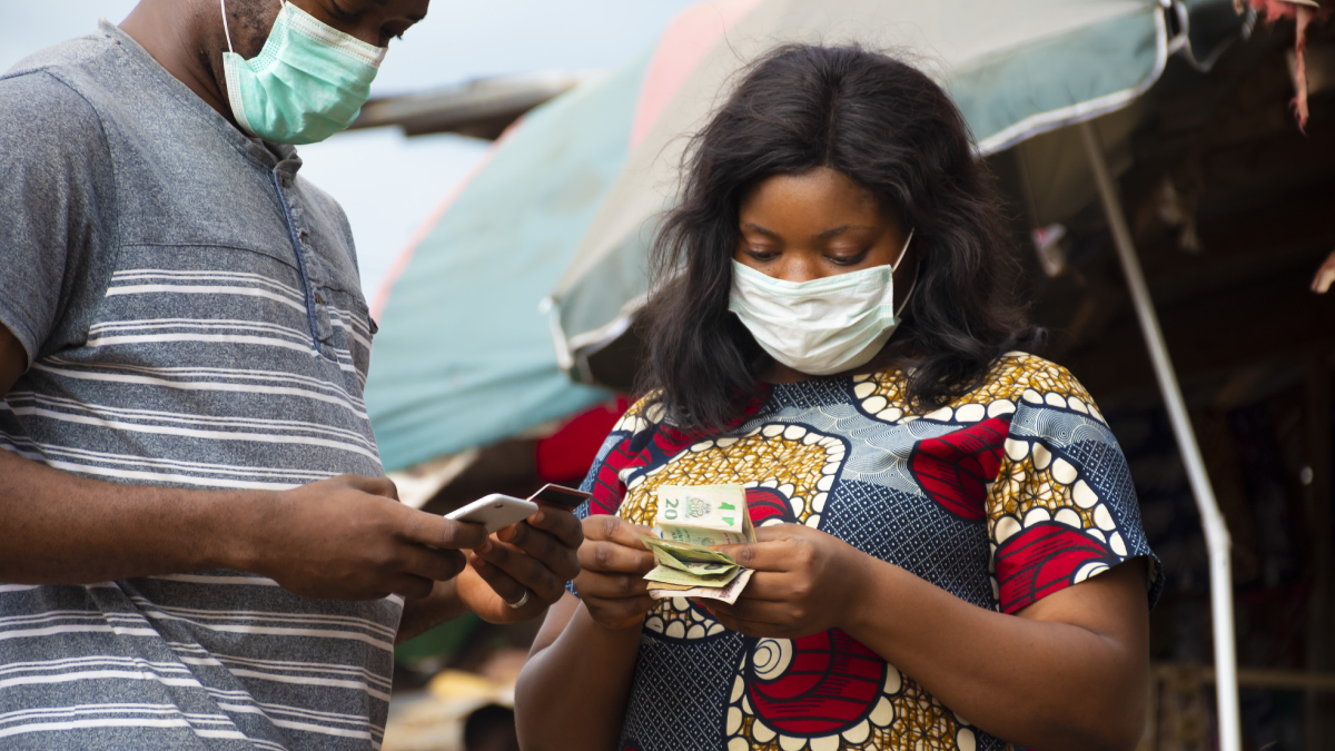 African woman taking digital payment 