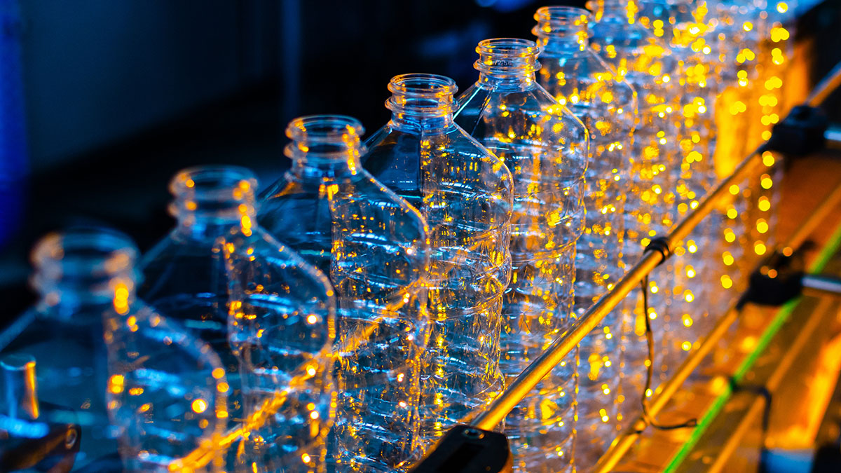 Row of plastic bottles on the production line