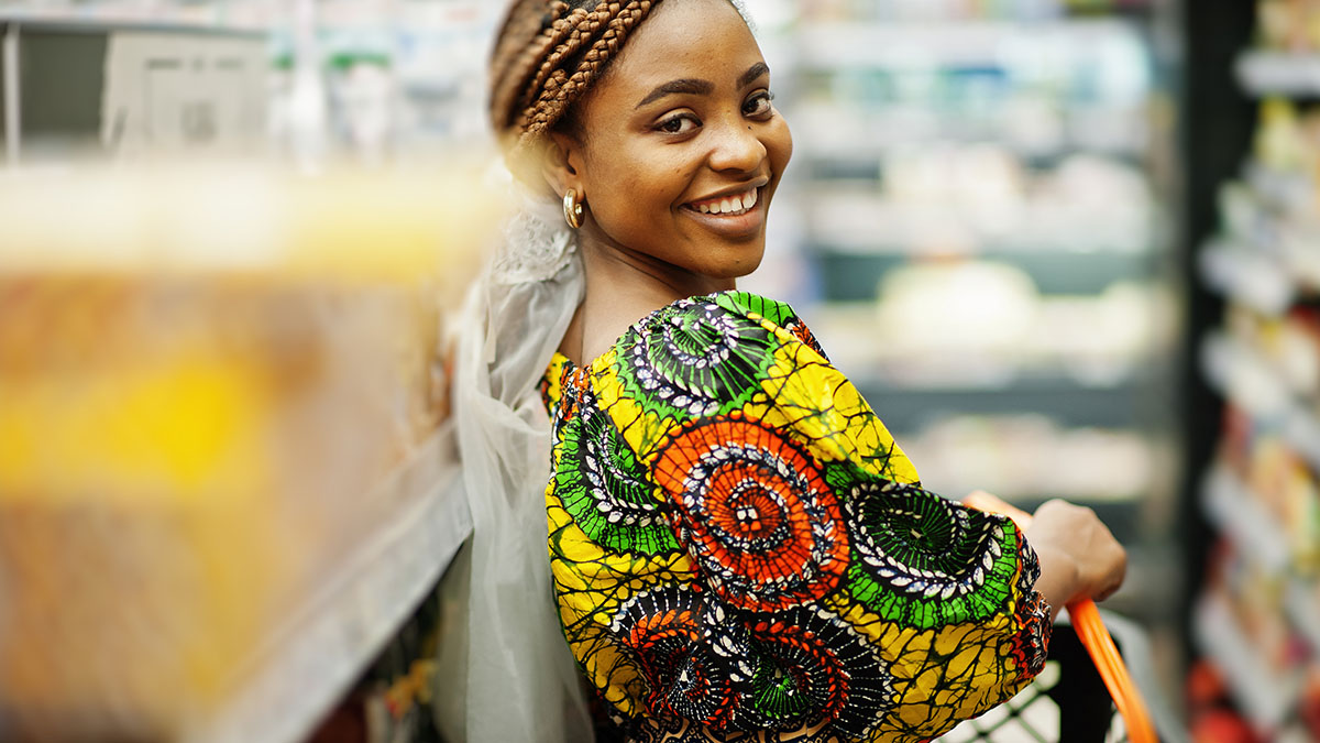 African woman shopping in supermarket