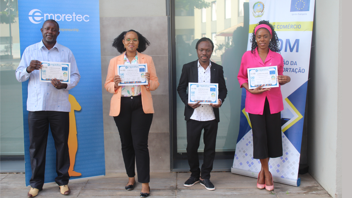 Four Angolan Empretec trainers holding their certificates
