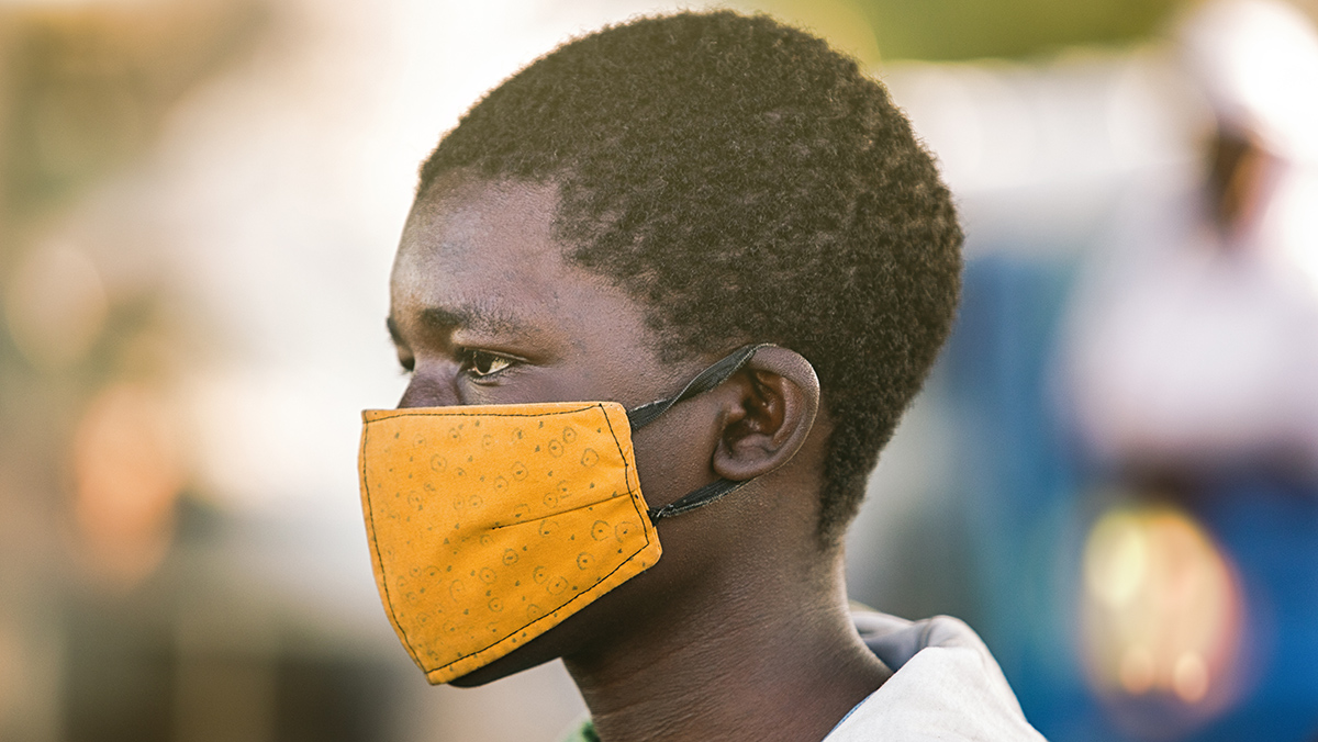African boy with medical mask