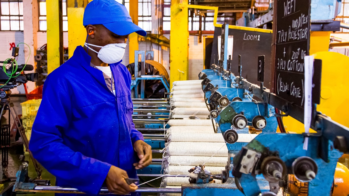 Factory worker, South Africa.