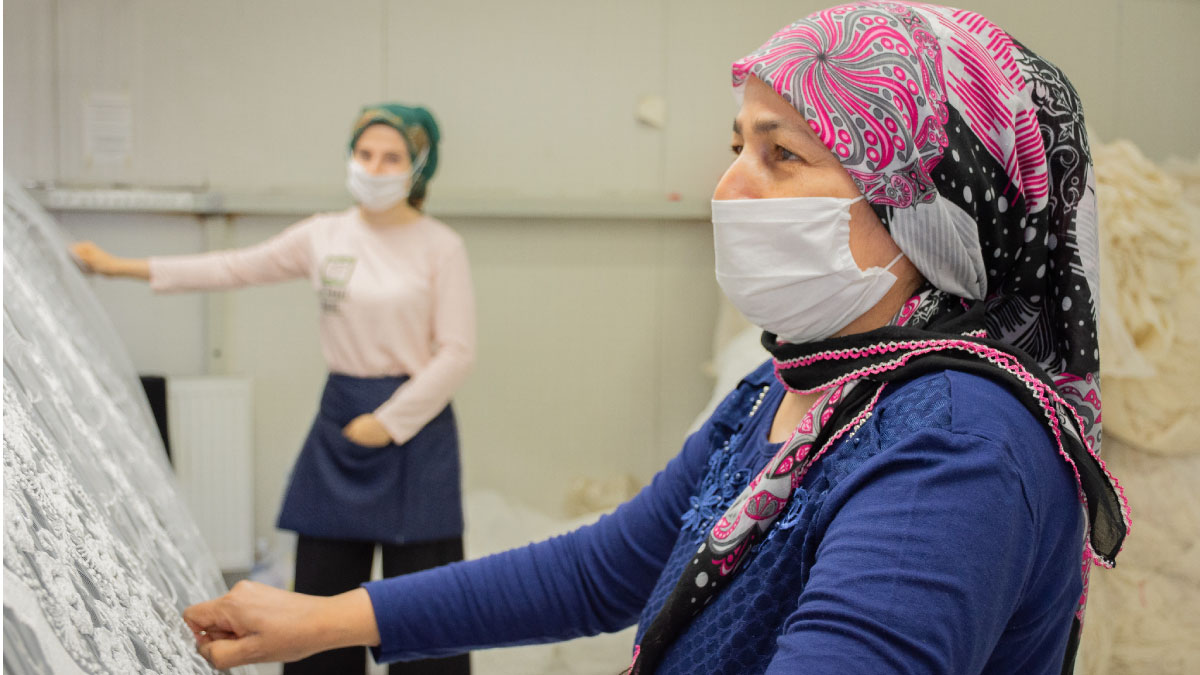 Women textile workers perform quality control tests in İzmir, Turkey.