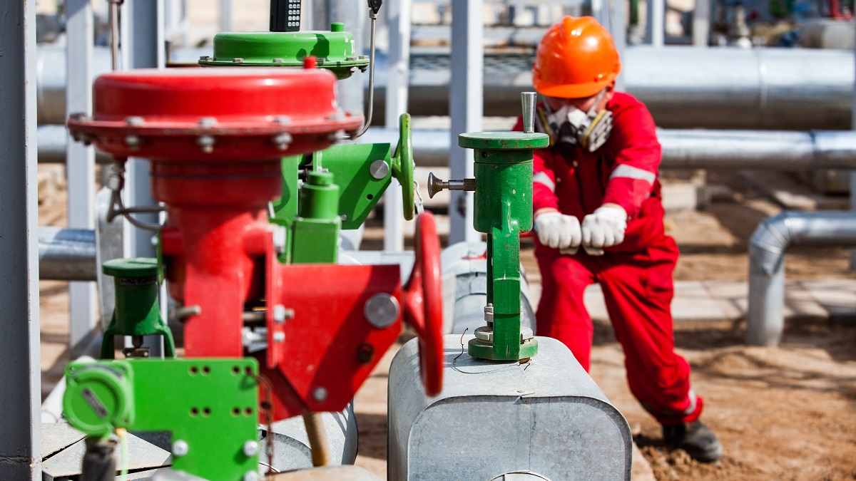 A worker in an oil refinery in the Kyzylorda region of Kazakhstan