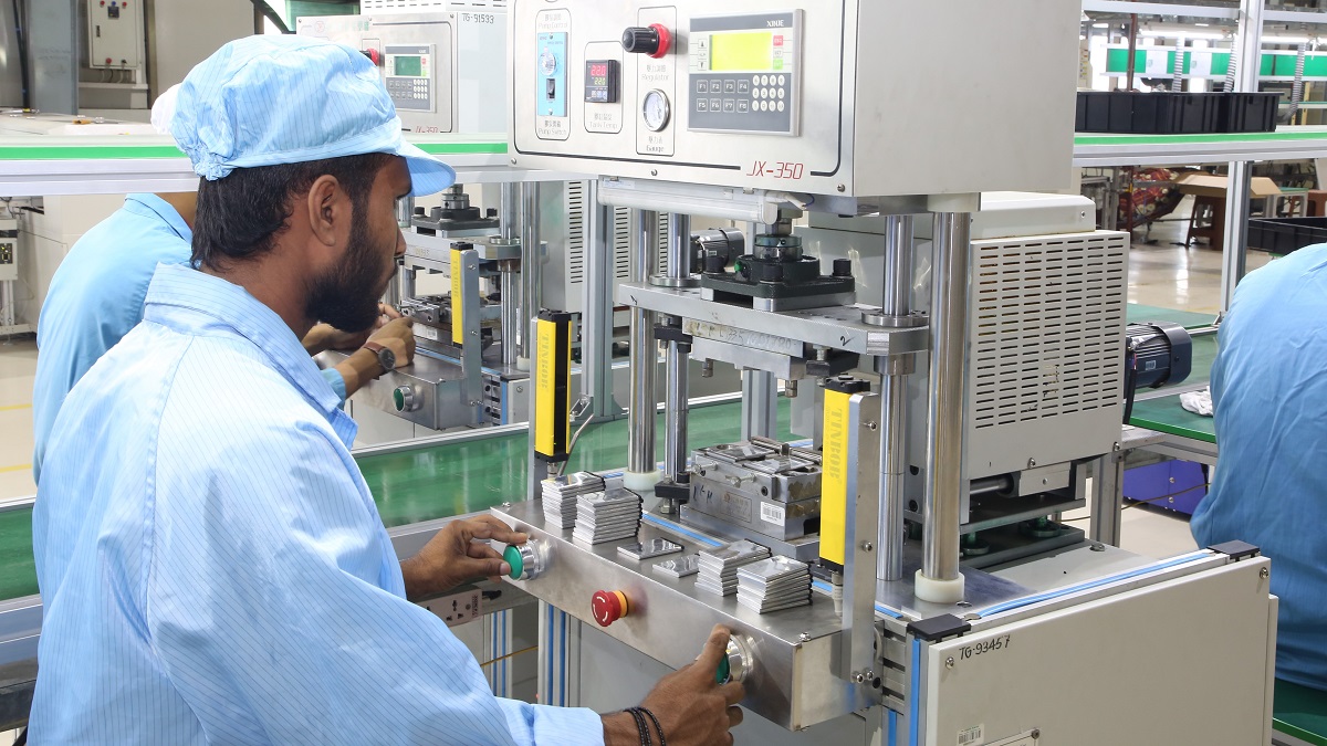 Workers at a lithium battery factory in Dhaka, Bangladesh.