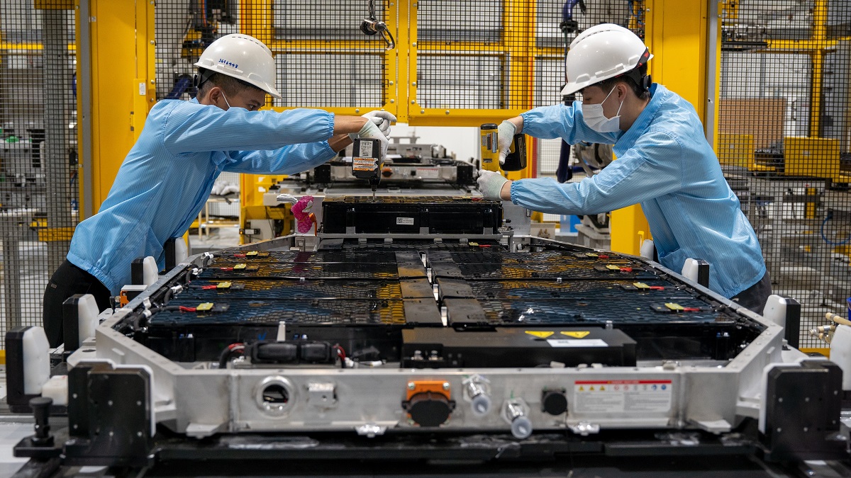 Workers in an electric car battery factory in Vet Nam