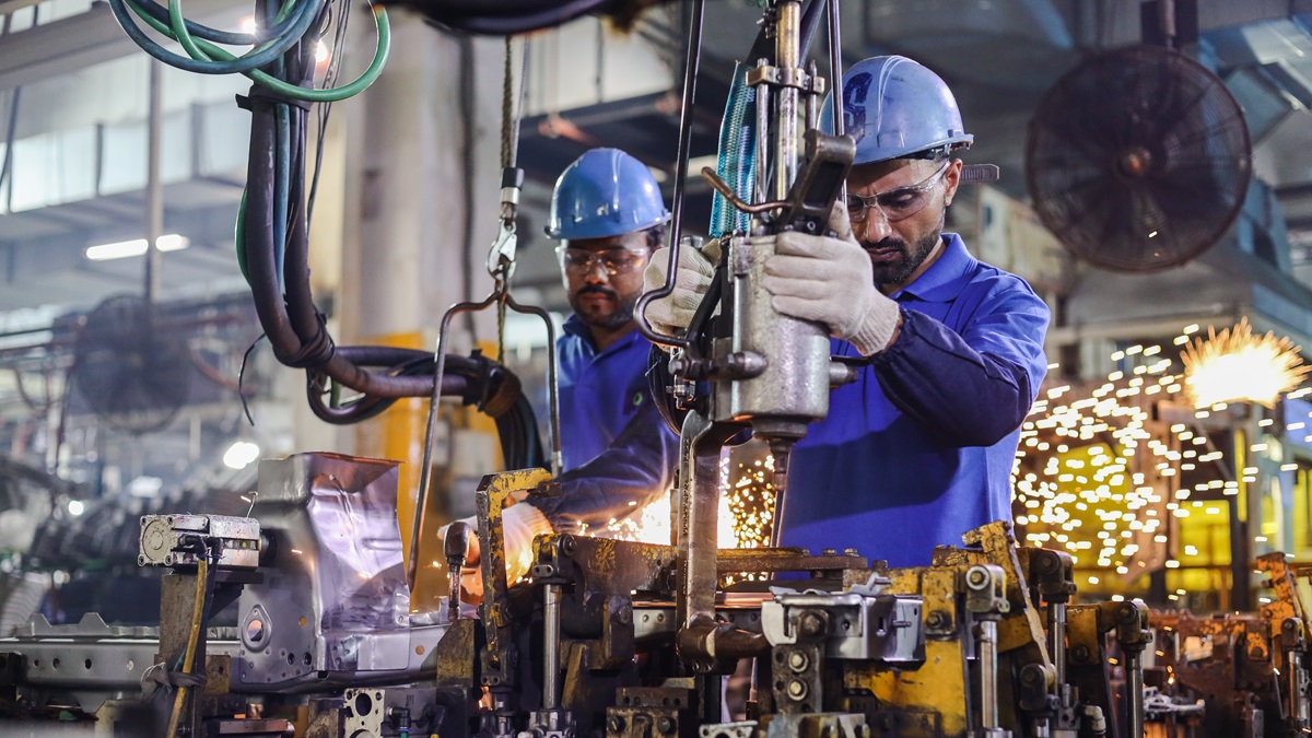 Engineers working in Automobile assembly line production in an automobile company in Karachi, Pakistan