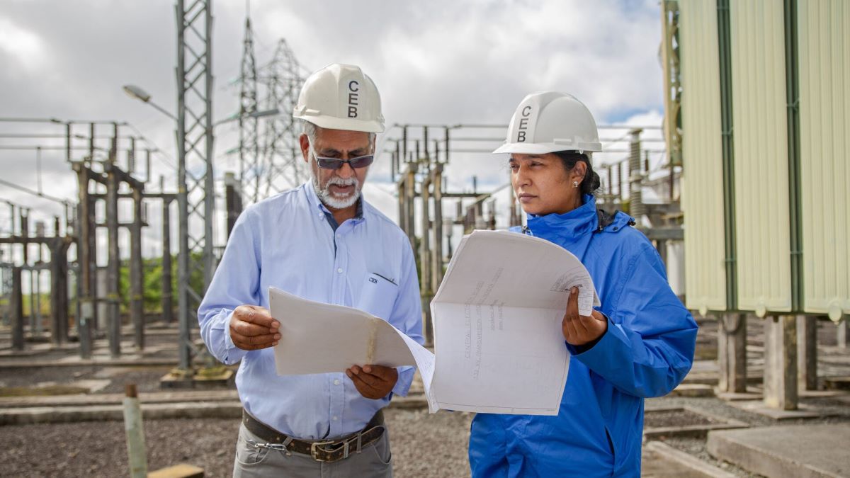 Workers at an electric grid project in Mauritius.