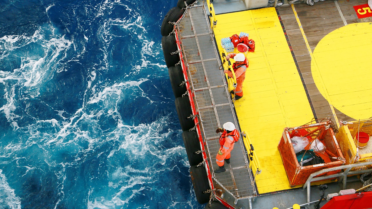 Oil cargo transfer operations at sea.