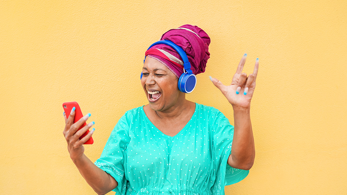 African woman listening to music