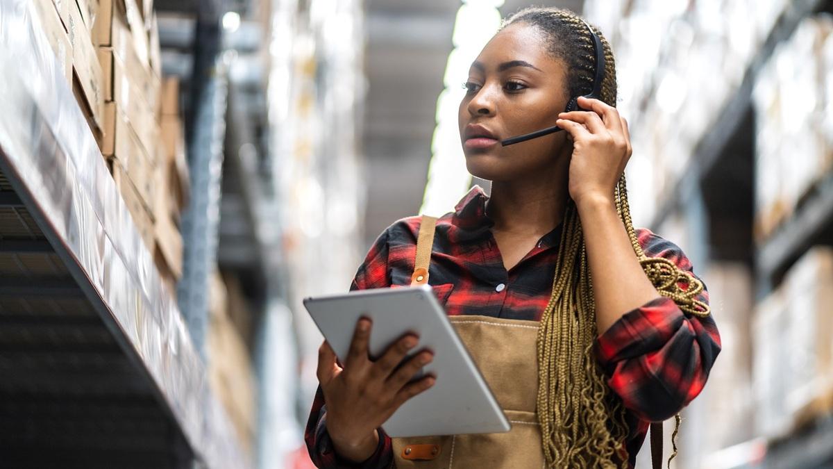 Woman logistics manager at a warehouse.