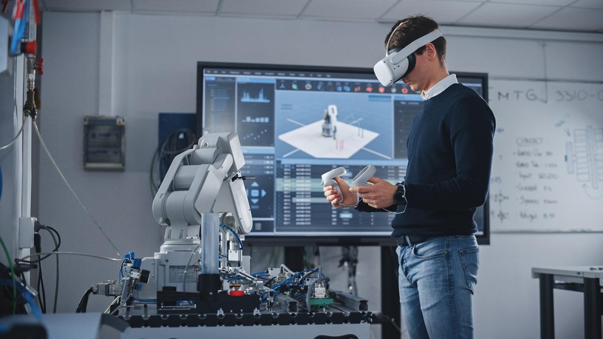An engineer interacts with a virtual reality device.